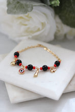 Load image into Gallery viewer, Money Bag Evil Eye Bracelet