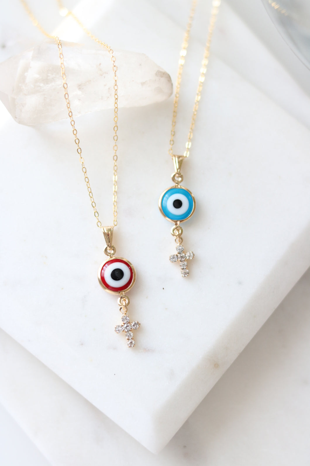 CROSS EYES CHARM NECKLACE